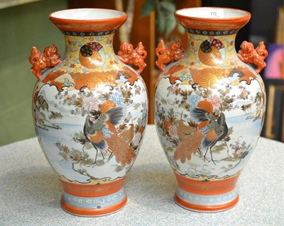 Lot 70 - A pair of Kutani vases