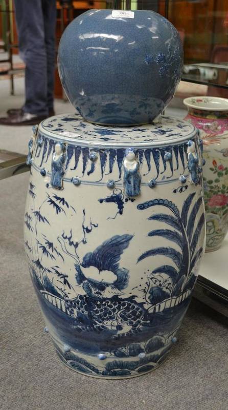 Lot 86 - A Chinese Porcelain Garden Seat, of barrel form, painted in underglaze blue with mythical...