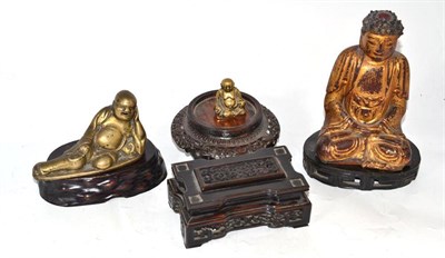 Lot 74 - Four Chinese hardwood stands, two metal Buddhas and a gilt Buddha