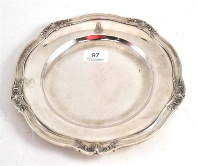 Lot 97 - A Sterling silver plate, bears convention marks, with an Arabic? coat of arms and shell pattern...