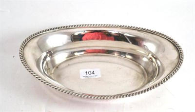 Lot 104 - A silver oval basket, Sheffield 1942/1967