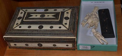 Lot 110 - A 19th century Indian ivory casket and a carved Indian figural group