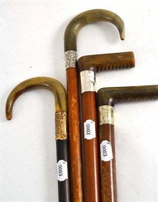 Lot 146 - Four horn handled walking sticks