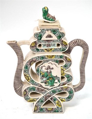 Lot 94 - A Chinese Porcelain Wine Pot and Cover, in Kangxi style, formed as a script character with lion dog