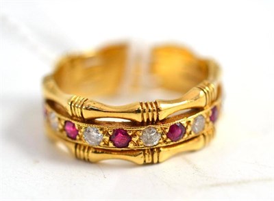 Lot 164 - An 18ct gold ring, set with rubies and diamonds