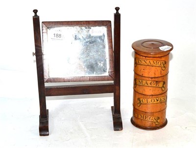 Lot 188 - A 19th century four tier spice tower and a miniature toilet mirror