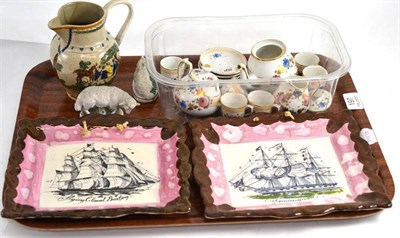 Lot 197 - A tray including two Sunderland lustre plaques decorated with ships -";Flying Cloud Boston";...