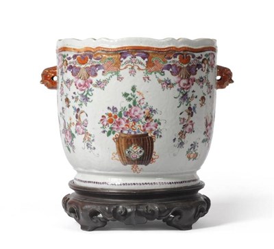 Lot 99 - A Chinese Porcelain Wine Cooler, Qianlong, with mask handles, painted in famille rose enamels...