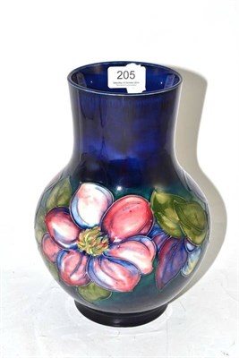 Lot 205 - A Moorcroft 'Clematis' pattern vase, 25cm high