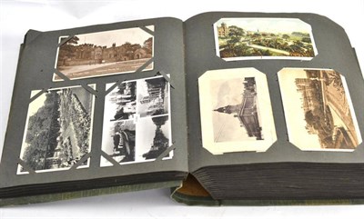 Lot 230 - An album containing five hundred mixed postcards including a quantity of Yorkshire