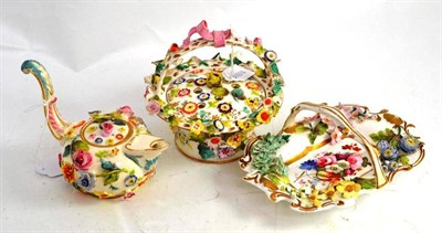 Lot 250 - A flower encrusted pot pourri vase and cover, basket and jug and cover