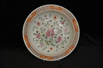 Lot 105 - A Chinese Porcelain Rosewater Dish, Qianlong, of fluted circular form with raised central boss,...