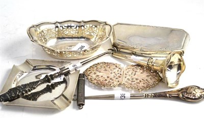 Lot 281 - A silver purse, a bonbon dish, an ashtray, pencil, posy holder, two button hooks and a nurses...