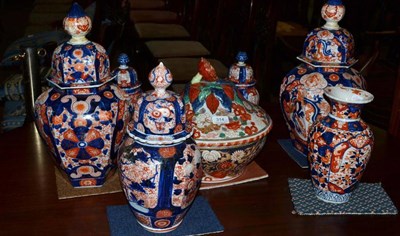 Lot 314 - A collection of Japanese Imari porcelain including a covered bowl, two pairs of vases and two...