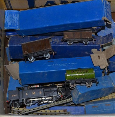 Lot 321 - A collection of Hornby Dublo trains, including LMS tan no. 6917