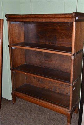 Lot 409 - An oak sectional bookcase (en-suite with lot 406)