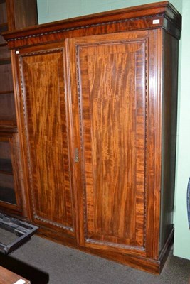 Lot 410 - 19th century mahogany two door wardrobe