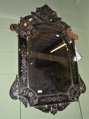 Lot 417 - A Venetian pier glass mirror with floral decoration