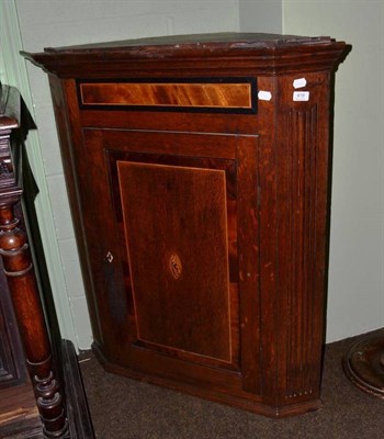 Lot 419 - Georgian oak corner cupboard