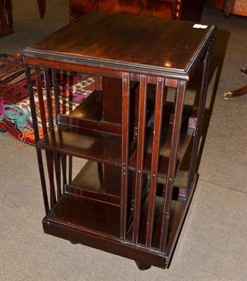 Lot 444 - An Edwardian two tier revolving bookcase