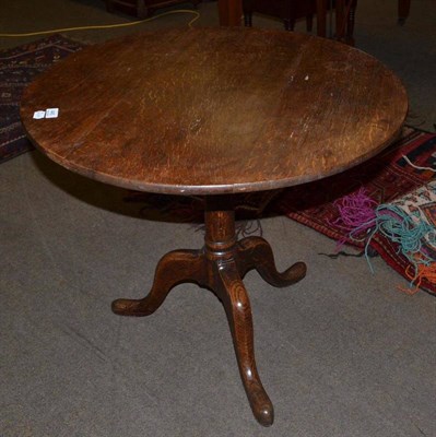 Lot 445 - George III oak tripod table