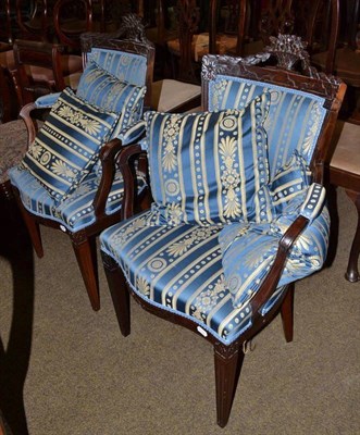 Lot 460 - Two upholstered armchairs and four cushions