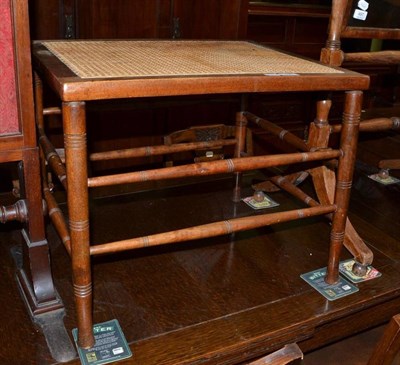 Lot 498 - Late Victorian caned luggage stand