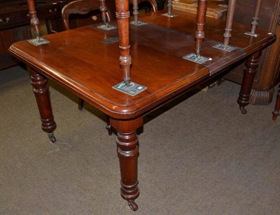 Lot 499 - Mahogany extending dining table