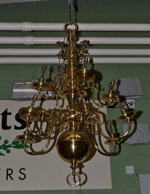 Lot 524 - A large brass chandelier