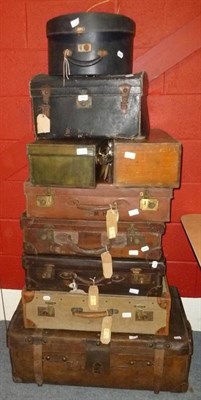 Lot 564 - Seven suitcases, a hat box and a wooden box