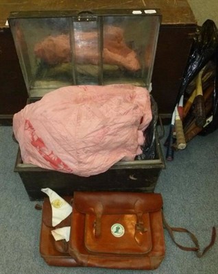 Lot 573 - Two trunks containing various linens and textiles, tennis rackets, etc