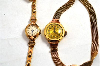Lot 10 - A 9ct gold lady's Tudor wristwatch and a lady's 18ct gold wristwatch on a yellow metal bracelet...