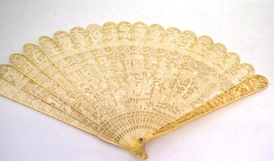 Lot 137 - A Cantonese Ivory Brisé Fan, 19th century, carved and pierced with figures in landscape...