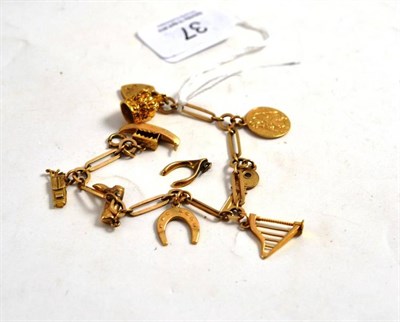 Lot 37 - A 9ct gold charm bracelet