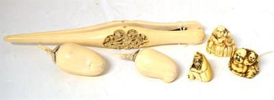 Lot 142 - A Set of Cantonese Ivory Glove Stretchers, circa 1890, carved with figures amongst pagodas and...