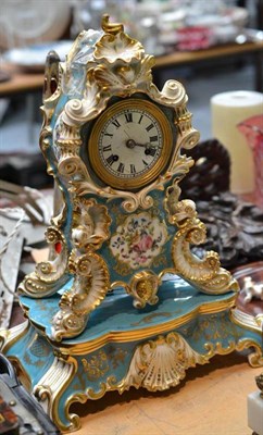 Lot 89 - A French porcelain striking mantel clock with base