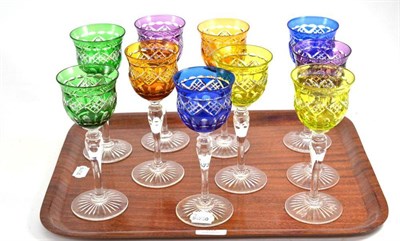 Lot 95 - A set of ten harlequin coloured wine glasses