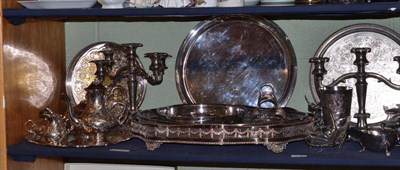 Lot 115 - A shelf of silver plate including a tray with shaped pierced gallery, a similar oval tray, two...