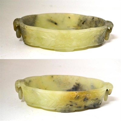 Lot 147 - A Pair Chinese Jade Bowls, 19th century, of lobed ovoid shallow form, each with double ringed...
