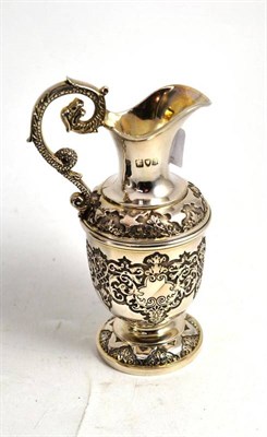 Lot 127 - A small heavy gauge silver ewer