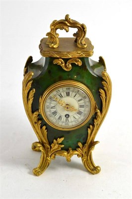 Lot 128 - A French gilt metal mounted mantel timepiece (a.f.)