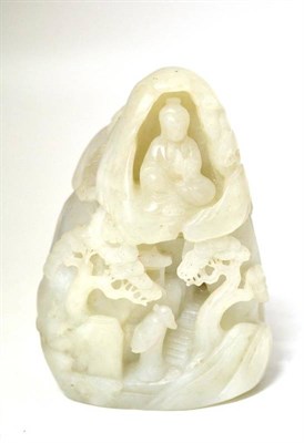 Lot 148 - A Pale Green Jade Boulder Carving, late 18th/early 19th century, depicting a seated deity in a...