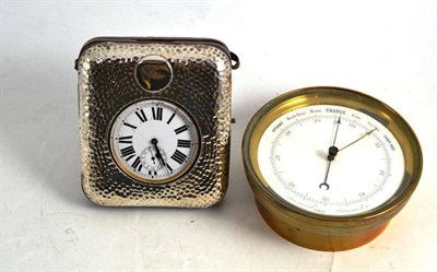 Lot 134 - A silver cased Goliath watch and a brass aneroid barometer with loop suspension