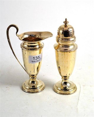 Lot 135 - A silver matching Walker & Hall sugar caster and ewer