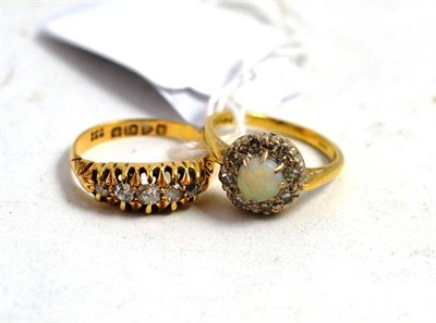 Lot 160 - An 18ct gold five stone diamond ring and opal set ring (2)