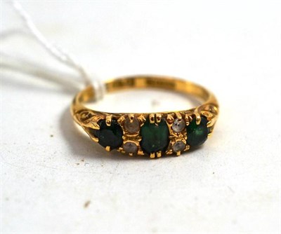 Lot 164 - An 18ct gold composite green stone and white stone ring, Chester, 1907
