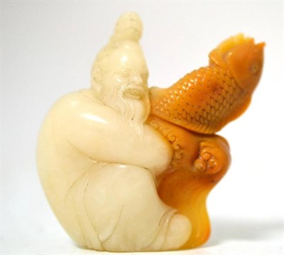 Lot 152 - A Chinese Carved Jade Figure Group, Qing Dynasty, of a seated man, his hair up, holding a carp...