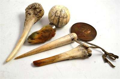 Lot 178 - An ivory billiard ball with scrimshaw decoration of a three masted schooner and set with a 3D coin
