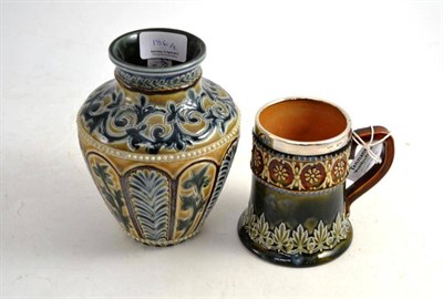 Lot 186 - A Doulton Lambeth stoneware vase, by Clara S Barke (restored); and a Doulton Lambeth stoneware mug