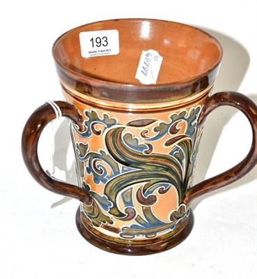 Lot 193 - A Doulton Lambeth stoneware tyg, by Mark V Marshall, 16.5cm